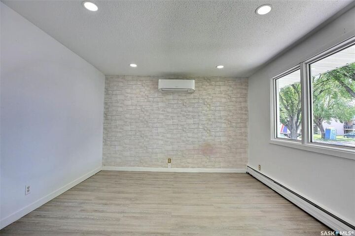 Property Photo:  243 Smith Street N  SK S4R 3B5 