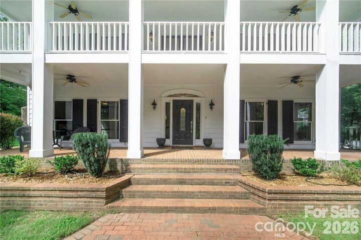 Property Photo:  9124 And 9126 S Providence Road  NC 28173 