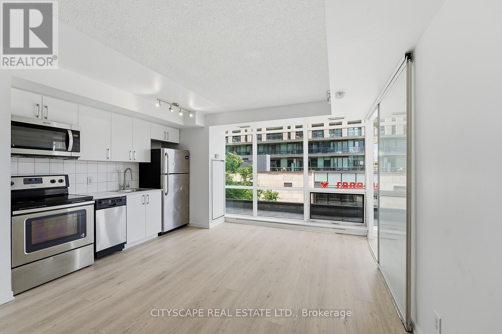 Property Photo:  20 Joe Shuster Way 211  ON M6K 0A3 