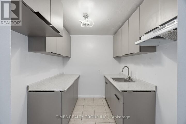 Property Photo: 212 Brock Street 106 ON K9H 2P5