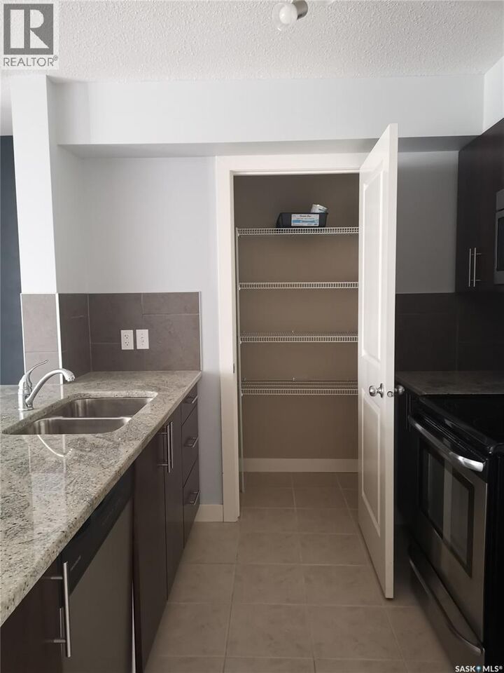 Property Photo: 104 306 Petterson Drive SK S4A 2A8