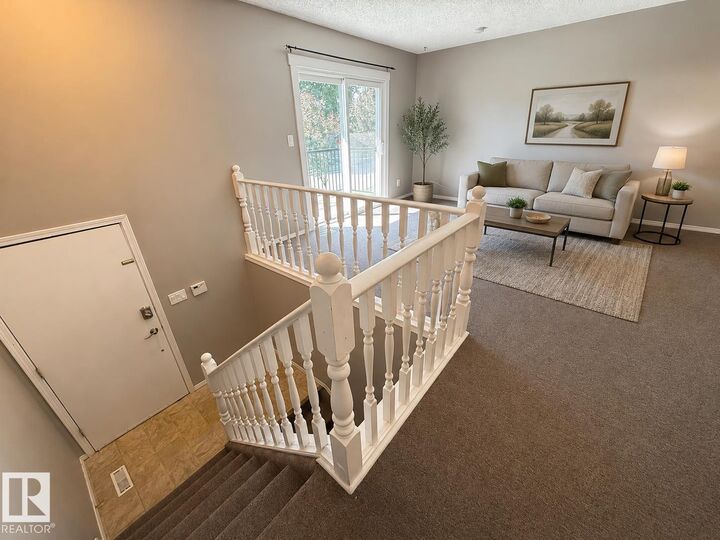 Property Photo:  8704 102 Avenue NW  AB T5H 4B7 