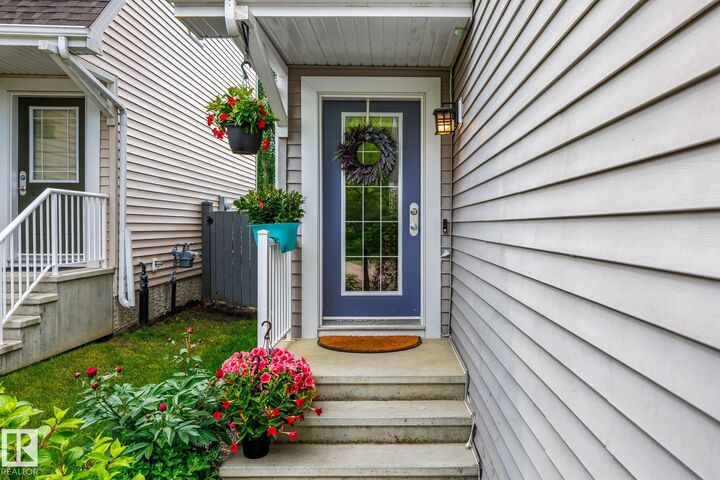 Property Photo:  4912 213 Street NW  AB T6M 0G6 