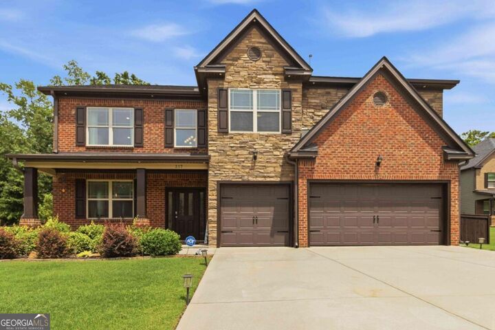 Property Photo:  217 Sebastian Cove  GA 30228 
