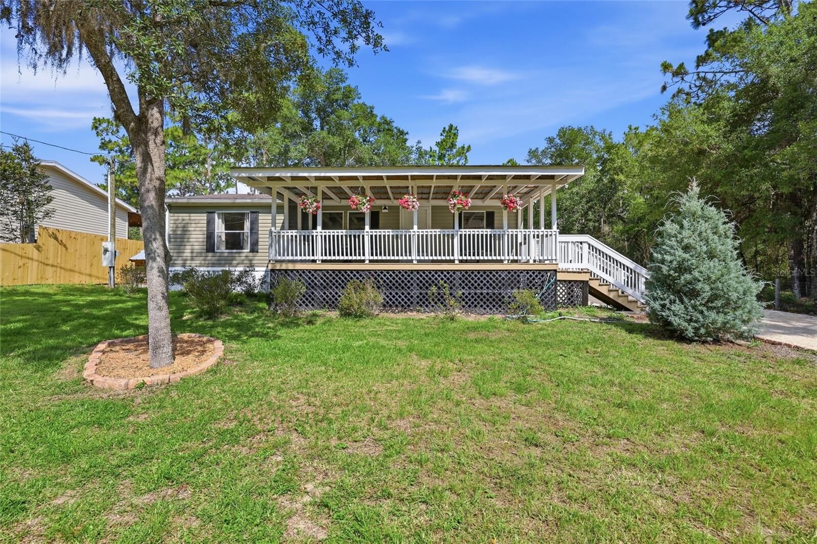 Property Photo:  750 NE 154th Terrace  FL 32696 