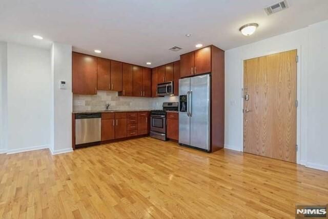 Property Photo:  17 Meadow Road 306  NJ 07070 