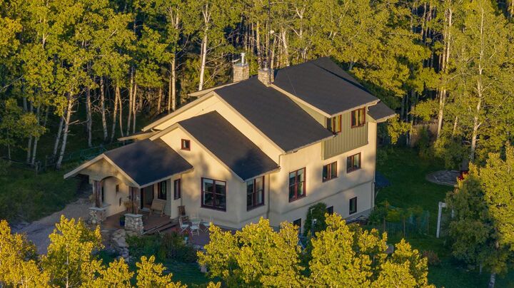 Property Photo:  290108 Parkins Road W 200  AB T0L 1K0 