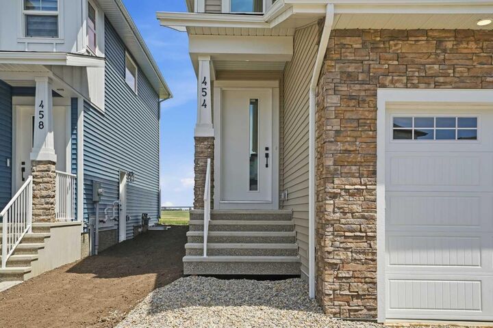 Property Photo: 454 Kinniburgh Loop AB T1X 3C2
