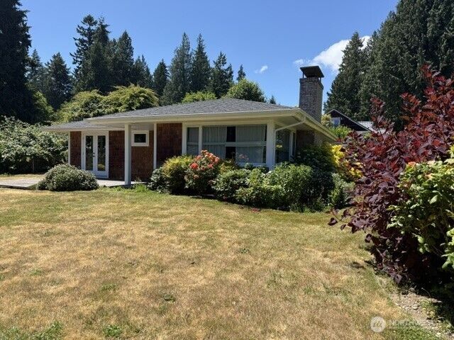 Property Photo:  10779 NE Valley Road  WA 98110 
