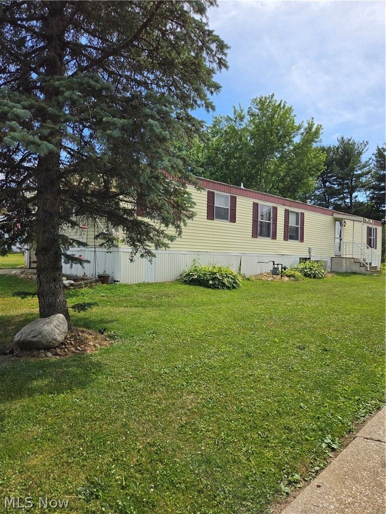 Property Photo: 99 Thomas Boulevard NW OH 44647