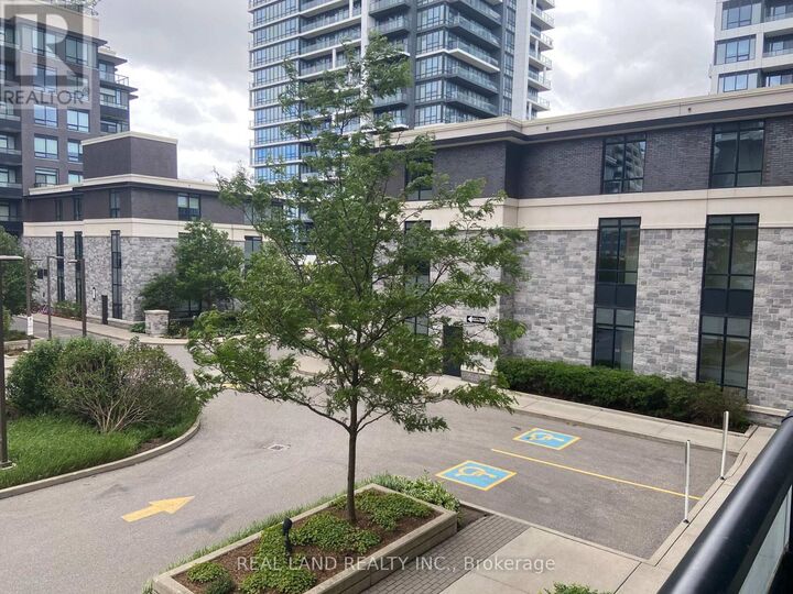 Property Photo: 25 Water Walk Drive 203 ON L6G 0G3