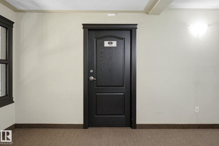 Property Photo: 9363 Simpson Dr NW 1223 AB T6R 0N2