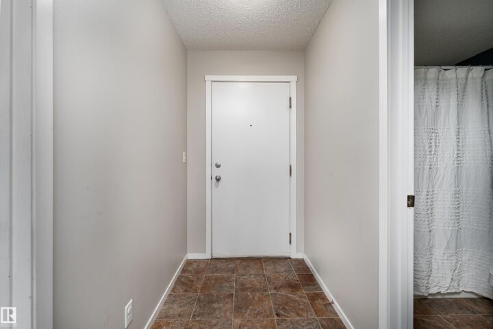Property Photo: 3207 James Mowatt Trail SW 117 AB T6W 3L6
