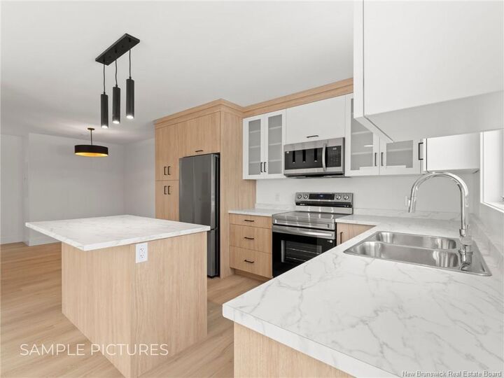 Property Photo: 61-71 &Amp 75-83 Violet Street NB E4P 0Z8