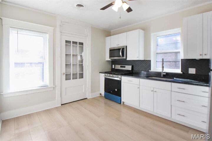 Property Photo:  7104 Tulane Avenue  MO 63130 
