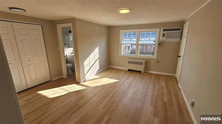 Property Photo:  64 Hastings B  NJ 07070 