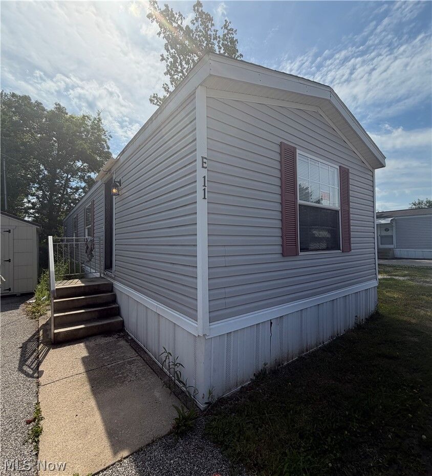 Property Photo: 5411 N River Road W E11 OH 44041