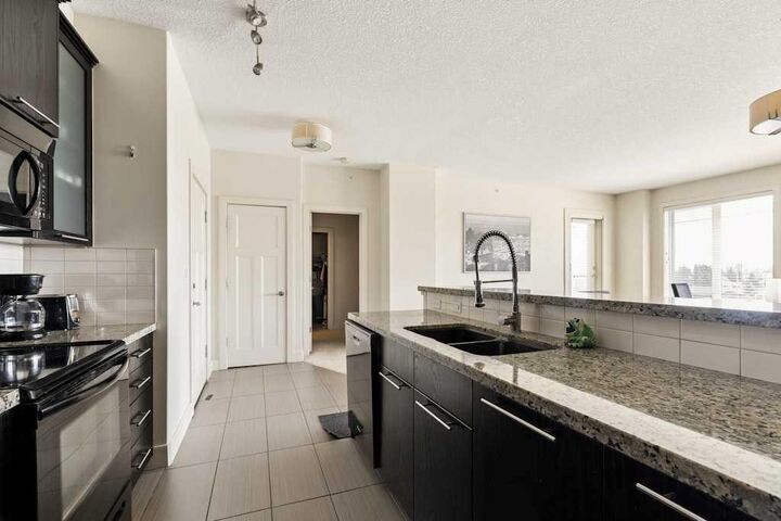 Property Photo: 3410 20 Street SW 313 AB T2S 2L4