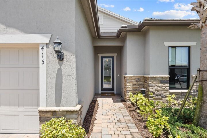 Property Photo:  415 SE Crathes Street SE  FL 34984 