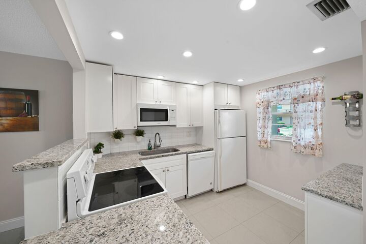 Property Photo:  100 Berkley Road 109  FL 33024 