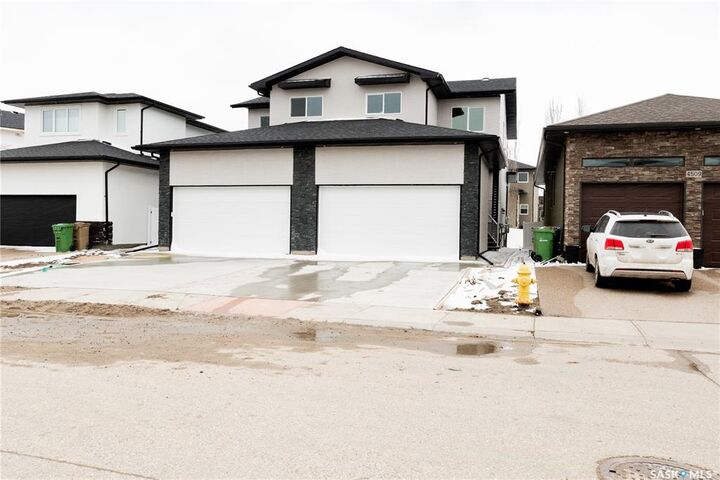 Property Photo: 4513 Green Brooks Way E B SK S4V 3K5