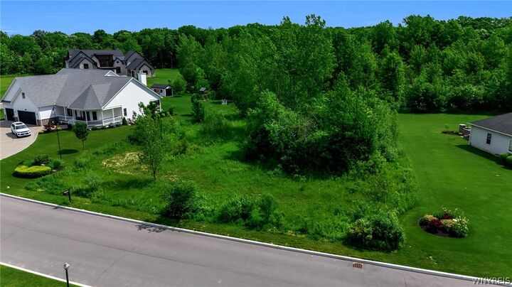 Property Photo: 5127 Country Club NY 14092