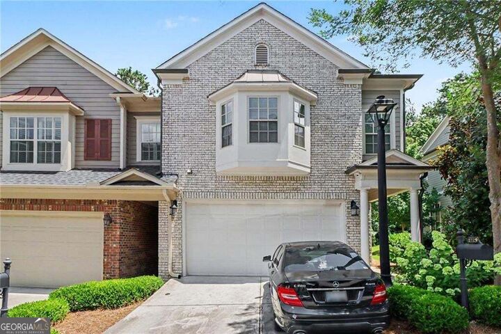 Property Photo:  1229 Olde Legacy Lane SE 15  GA 30126 