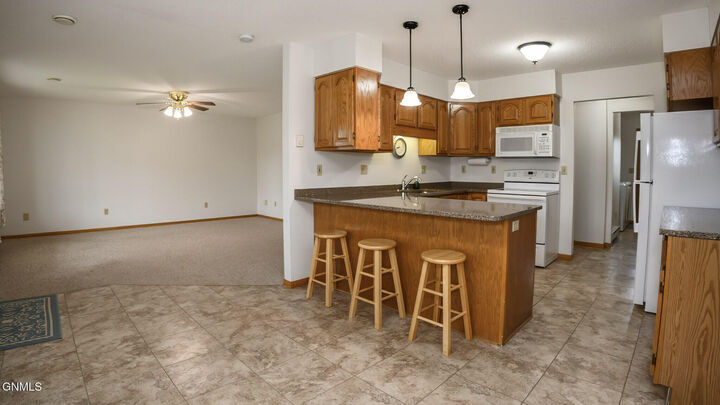 Property Photo: 100 7th Street NW 1C ND 58545