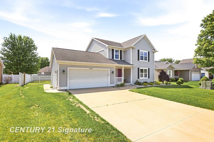 Property Photo:  8433 Waxwing Drive  MI 48623 