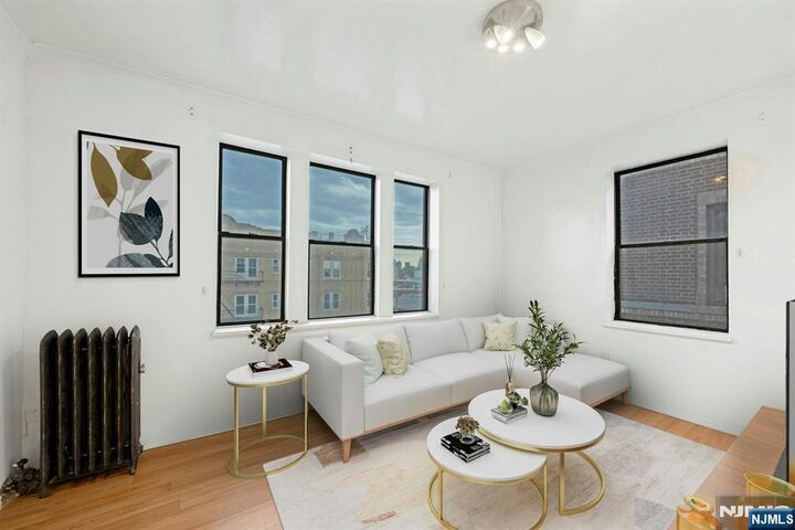 Property Photo:  6601 Bdway E7  NJ 07093 