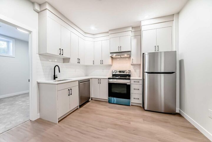 Property Photo:  6305 62 Street NW B  AB T3B 2C4 
