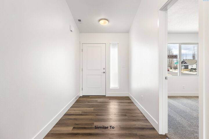 Property Photo:  722 Honeylicious St.  WA 99352 