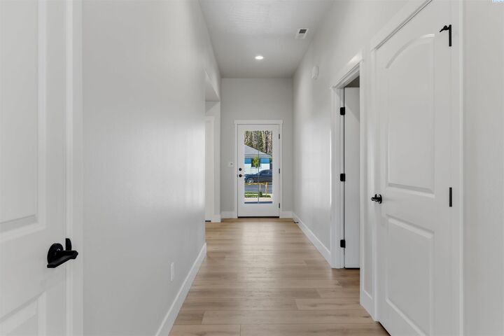 Property Photo: 10107 Redbud Dr WA 99301