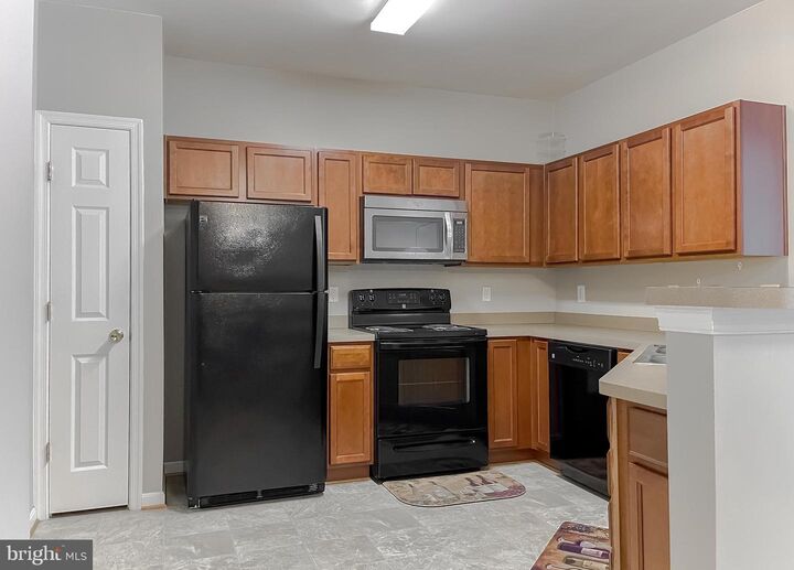 Property Photo:  23520 F D R Boulevard 205  MD 20619 