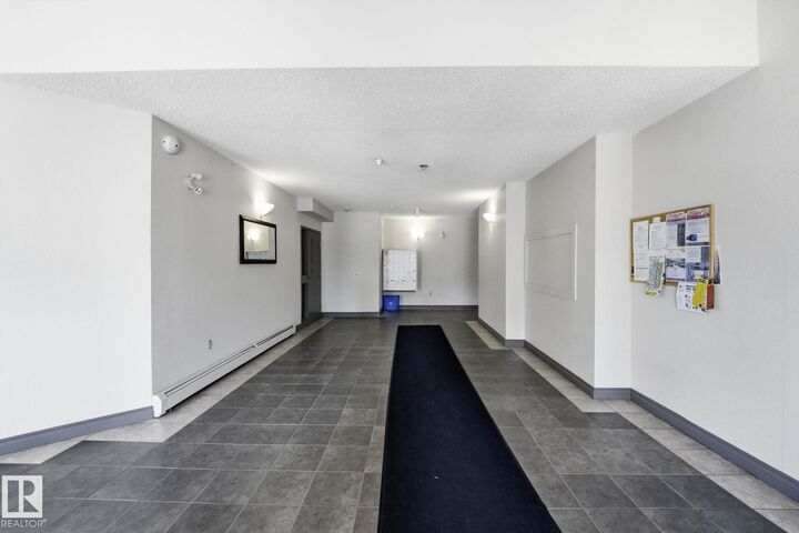 Property Photo:  11446 40 Avenue NW 105  AB T6J 0R5 