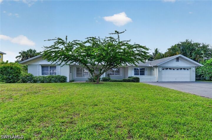 Property Photo:  1608 Crayton Road  FL 34102 