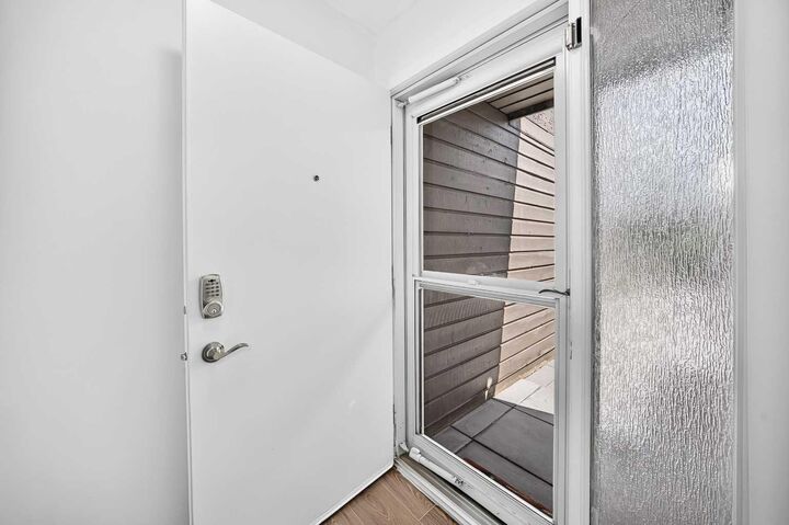 Property Photo: 829 Coach Bluff Crescent SW 205 AB T3H 1B1