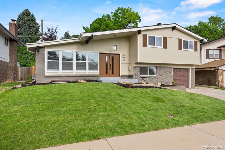 Property Photo:  3021 S Valentia Street  CO 80231 