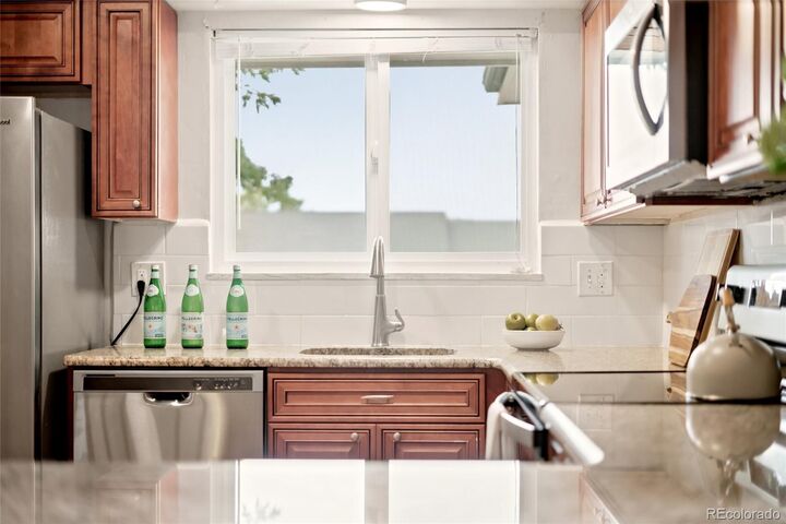 Property Photo:  1455 S Hoyt Street  CO 80232 