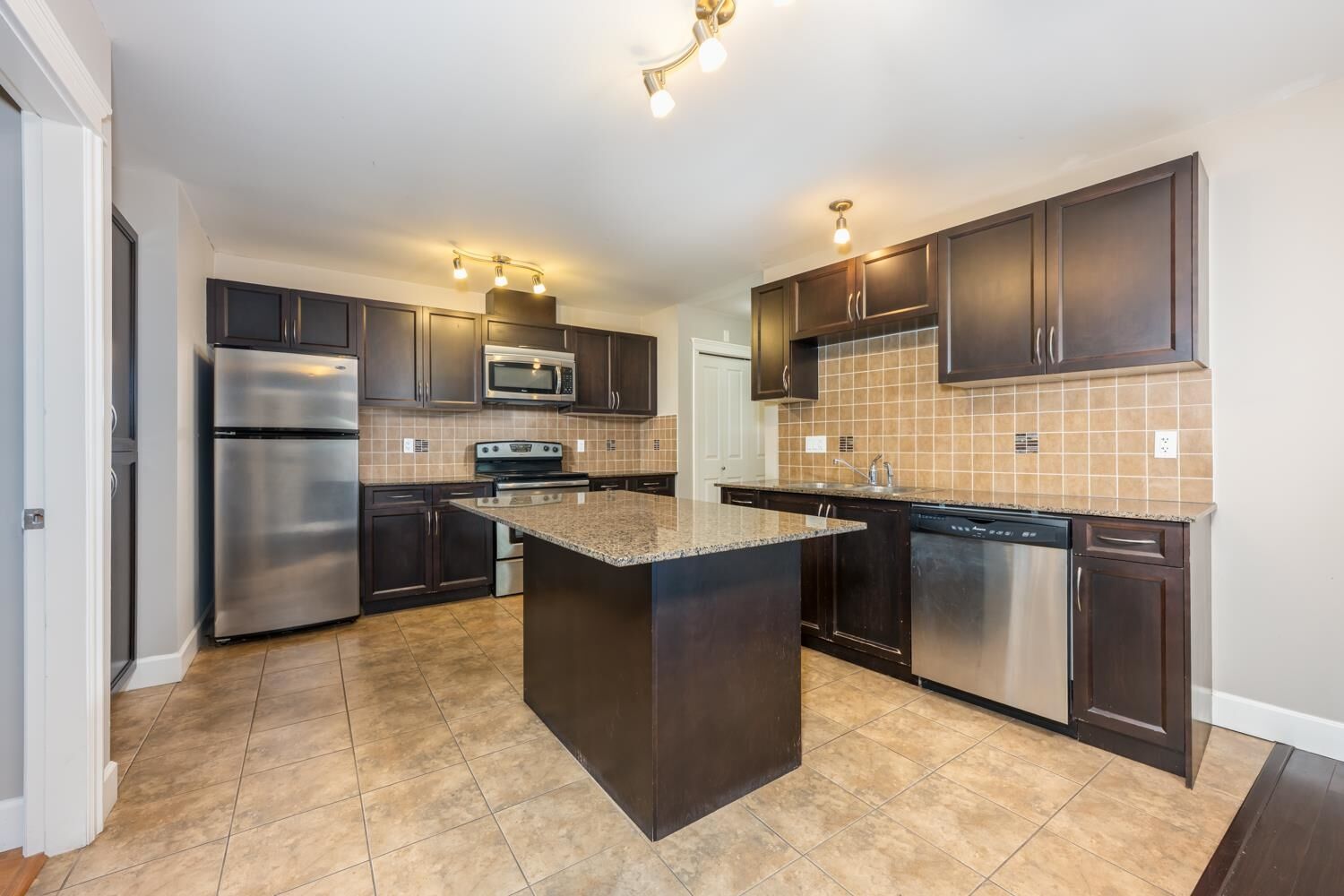 Property Photo: 12088 75A Avenue 311 BC V3W 1Y4