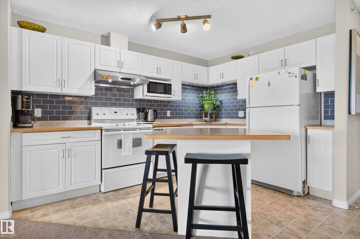 Property Photo: 11325 83 Street NW 526 AB T5B 4W5