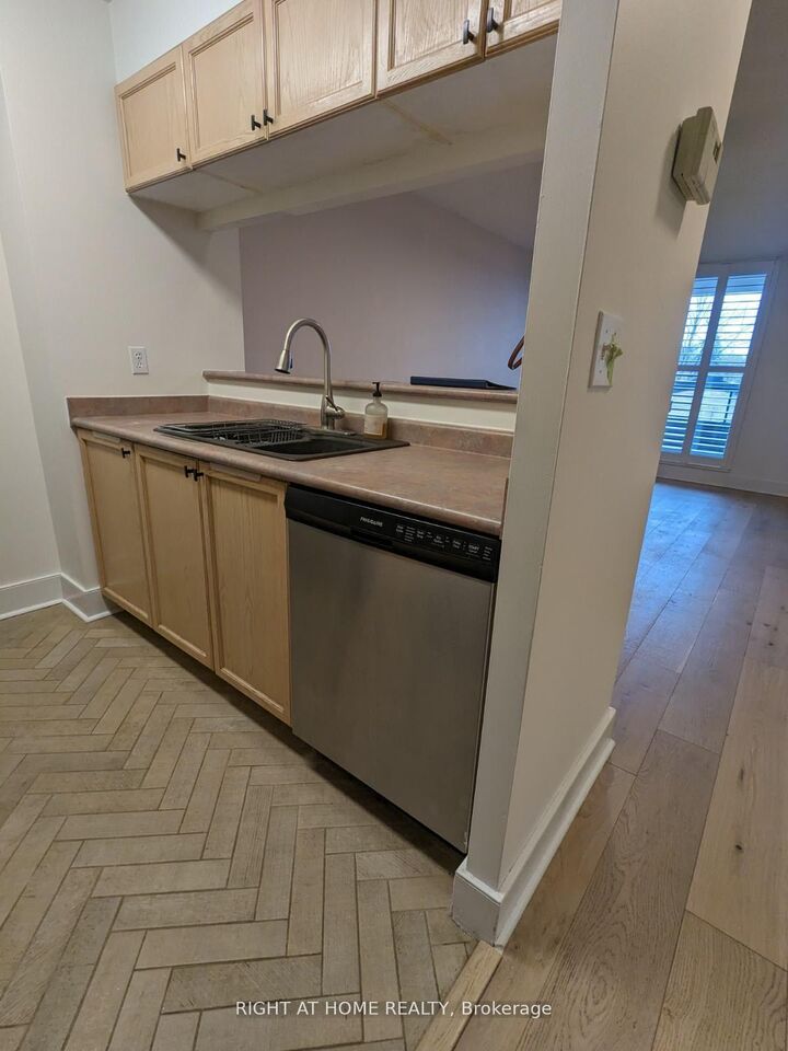 Property Photo:  1797 Queen Street E 409  ON M4L 3Y5 