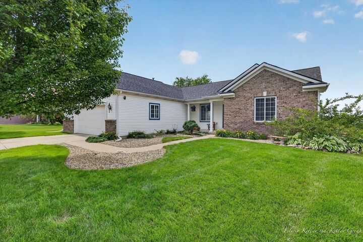 Property Photo:  2033 Orchard Ridge Drive NW  MI 49534 