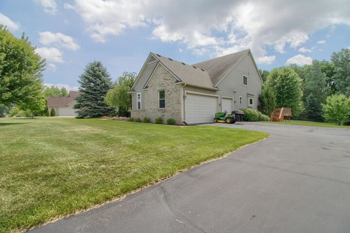 Property Photo:  6833 N Meadows Pass  MI 48130 