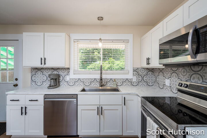 Property Photo:  4171 Miramar Avenue NE  MI 49525 