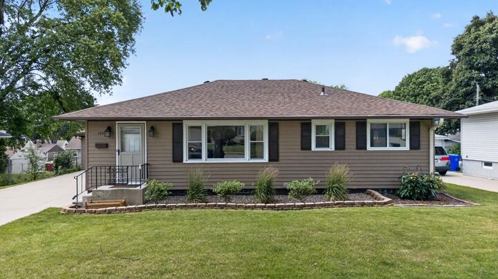 Property Photo:  1525 11th Avenue NE  MN 55906 