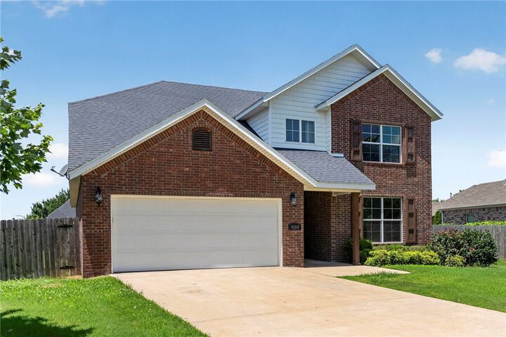 Property Photo:  4101 SW Hollyhock Street  AR 72713 