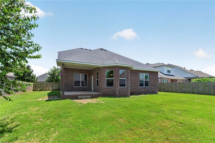 Property Photo:  4104 SW Hollyhock Street  AR 72713 