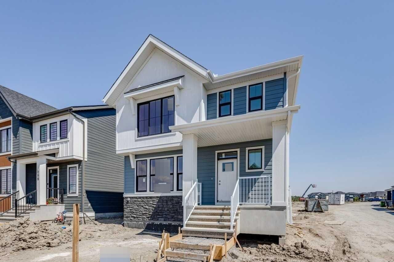 Property Photo: 202 Harmony Circle AB T3Z 0K9