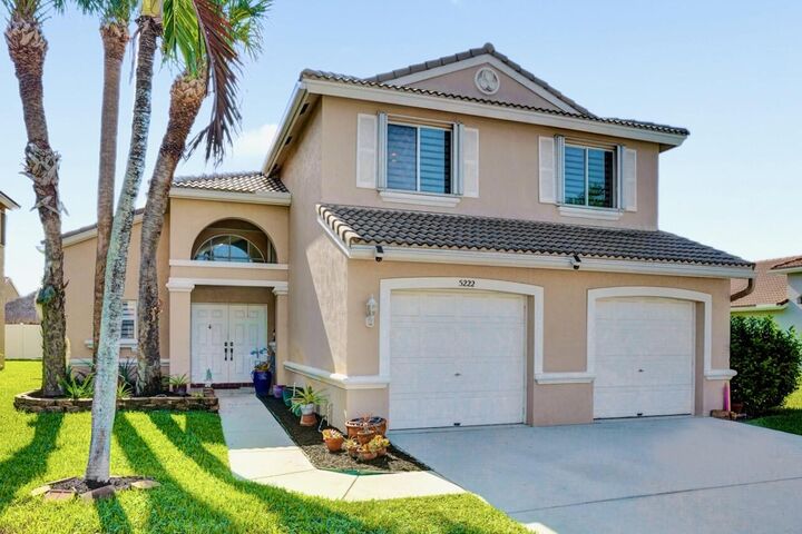 Property Photo:  5222 Prairie Dunes Village Circle  FL 33463 